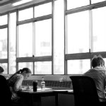 Photo of students working in one room of the medical library